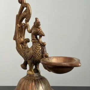 Annapakshi figurine with single diya on circular platform 7.6"