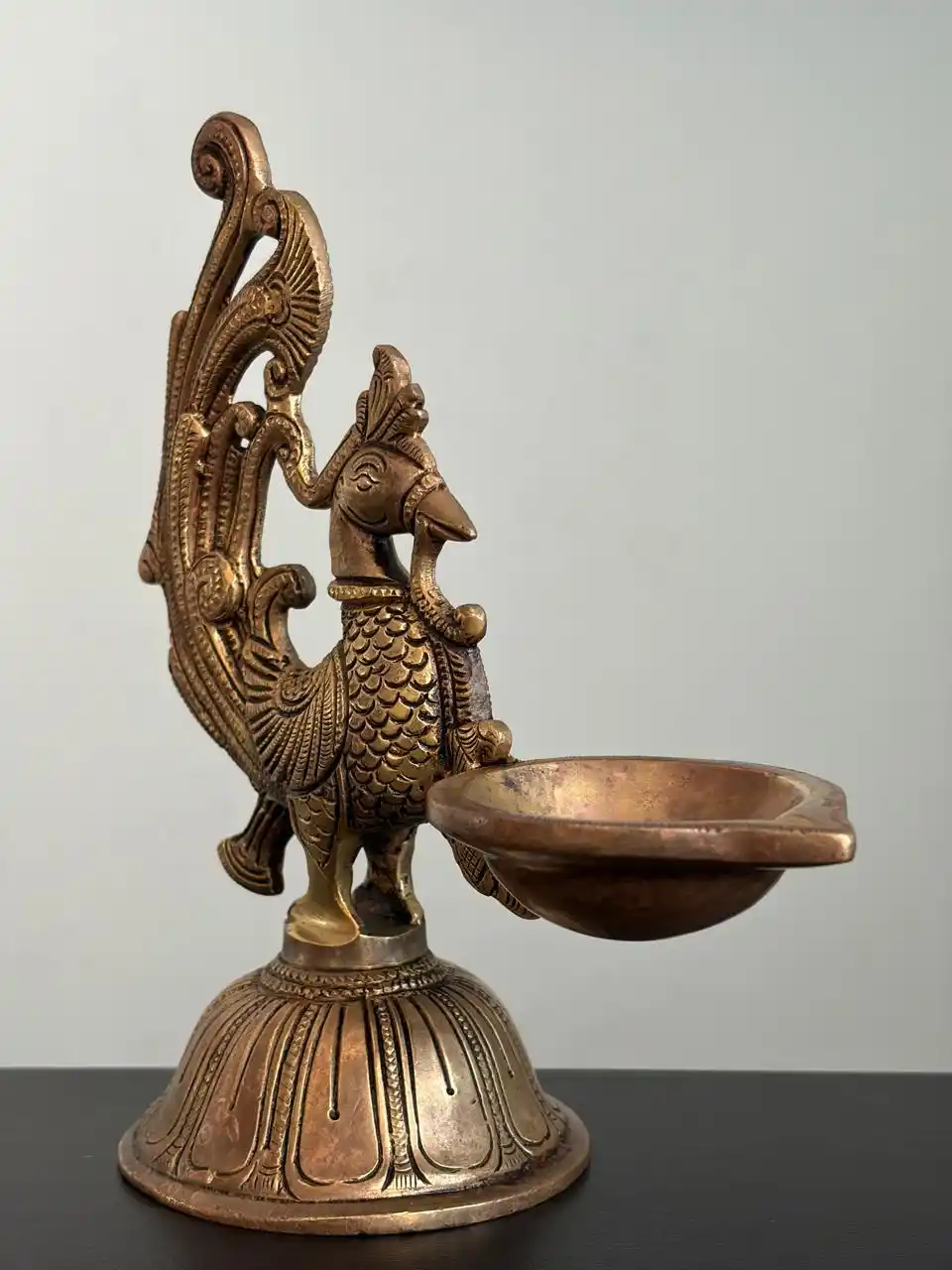Annapakshi figurine with single diya on circular platform 7.6"