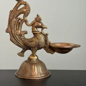 Annapakshi figurine with single diya on circular platform 7.6"