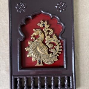 Brass Peacock motif(left looking) set in a traditional Indian wooden frame 12"